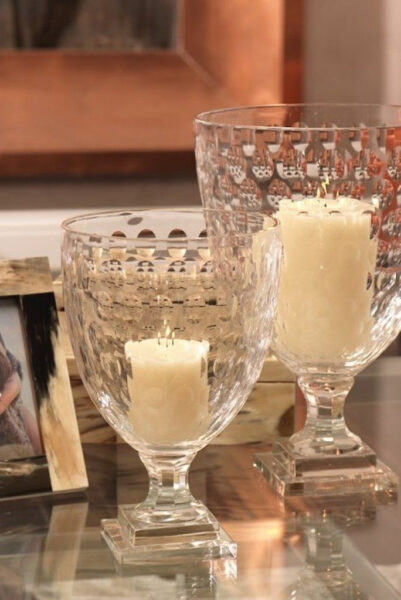 white pillar candle decoration in glass