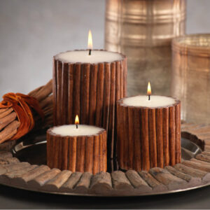 cinnamon scented candles in tray