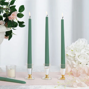 green taper candles with candlesticks