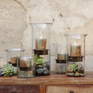 pillar candles in glass holders
