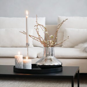 Decorate a coffee table with candles 