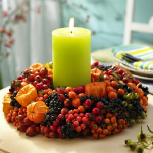 fall candle decoration with berries