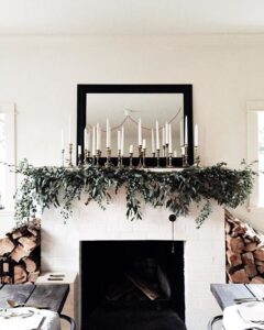 home interior taper candles on fireplace