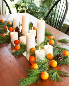 pillar candles and bright fruit
