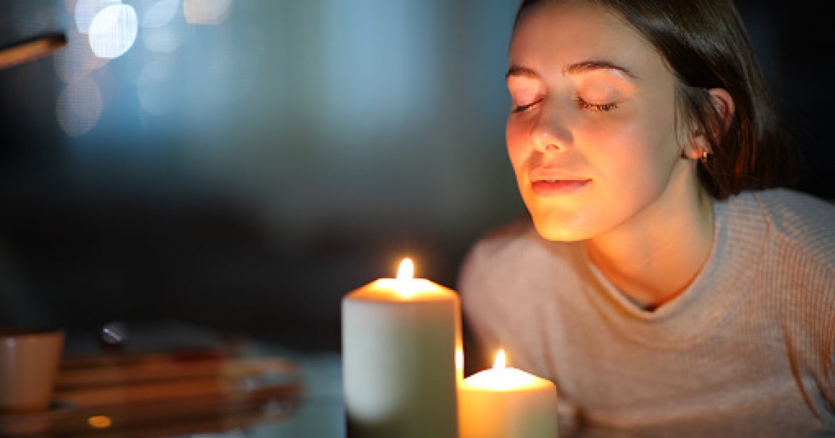 Achieve harmony by meditating with a flaming candle