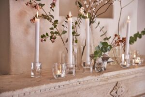 taper candles in glass candle holders