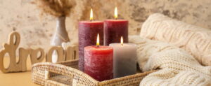 scented pillar candles in a tray