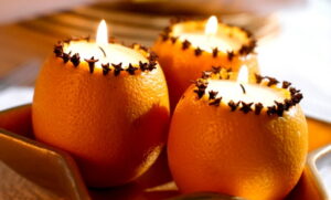 making candles in orange pulp