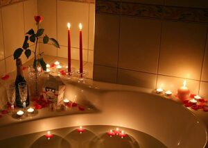 floating tealight candles with roses for bathroom decoration 