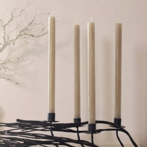 taper candles on iron candle holders 