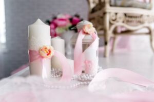 wedding pillar candle with pink ribbon