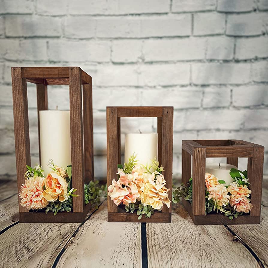 wooden candle lanterns with pillar candles for wedding decoration