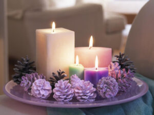 Candle decorations with pinecones 