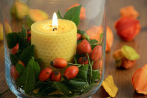 beeswax burning candle in a jar 