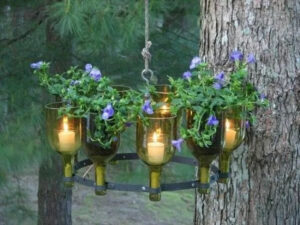 outdoor candles in a wine bottle