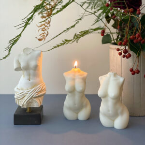 Unique candles in the form of the naked body 