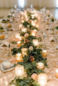 wedding table decoration with votive candles