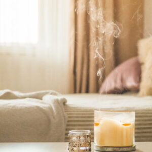 create a cozy atmosphere with scented candles 