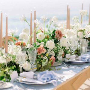 outdoor dinner table decoration with taper candles