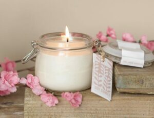rose scented soy aromatherapy candle in a jar
