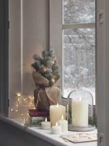 Christmas window decoration with candles 