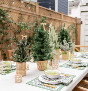 Holiday table with mini tree centerpiece 