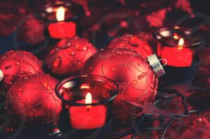 tealight burning candles and Christmas balls for winter holiday decoration 