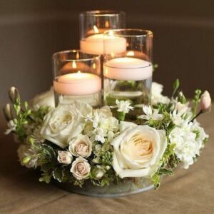 Flower wreath with candles for wedding table centerpiece 