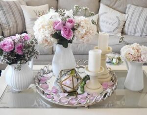 coffee table decoration with flowers and candles 