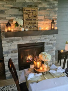 decorate fireplace with candles for candlelight dinner 