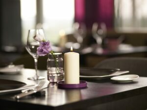 romantic dinner with pillar candles 