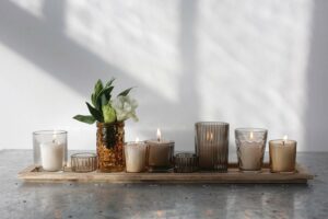 votive burning candles on tray 