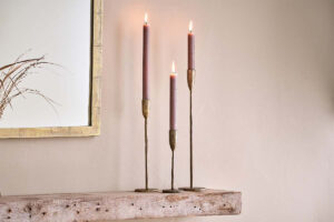 burning taper candles for home decoration 