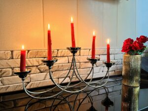 chandelier with red burning candles 