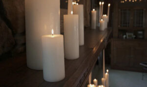 fireplace decor with pillar candles 
