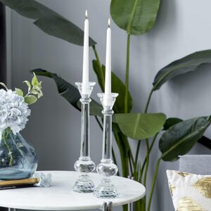 glass candleholders with white taper candles 