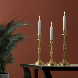 taper candles in candleholders 